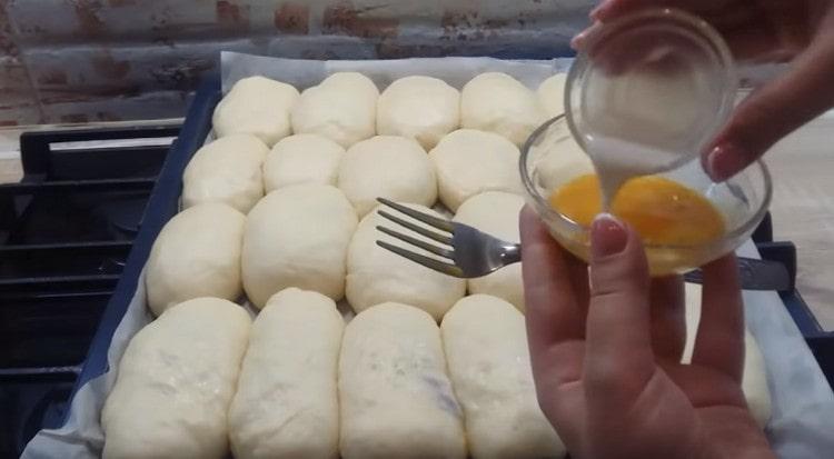 Beat the remaining egg yolk, add a little milk to it.