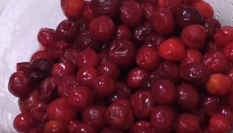 Put the cherry in a bowl.