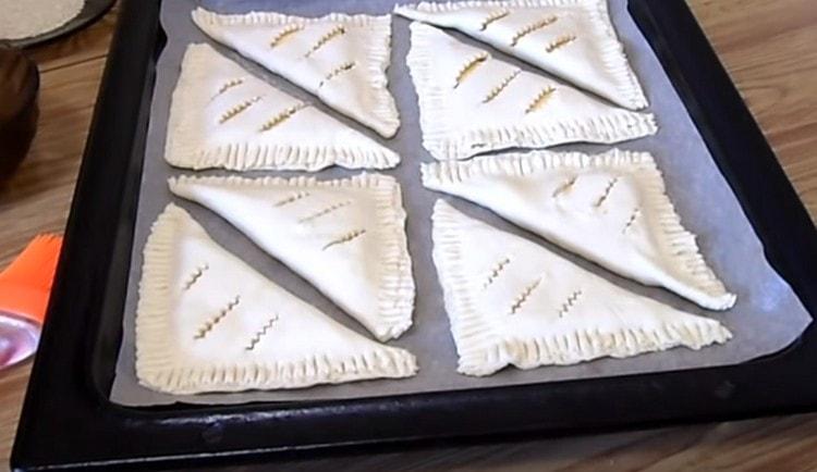 Lay out the layers on a baking sheet covered with parchment.