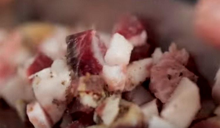 Cut the bacon into a small cube.