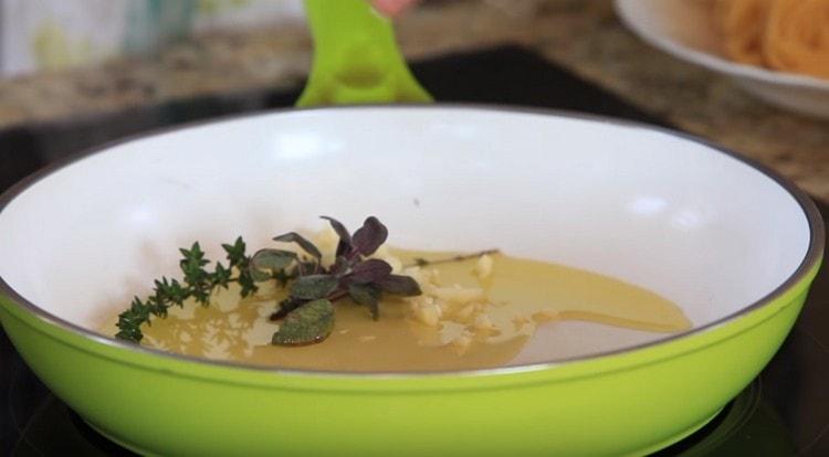 Grind the garlic and add to the pan.