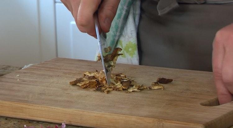 Grind dried mushrooms.