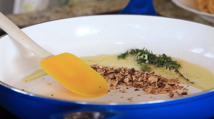 Add the mushrooms to the pan.