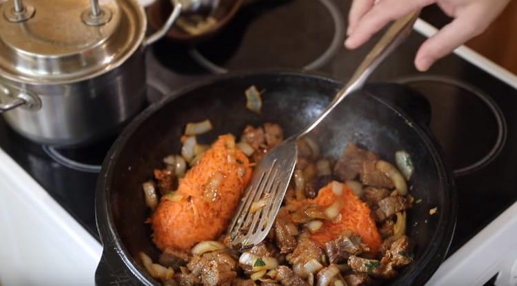 Next, add carrots to the pan.