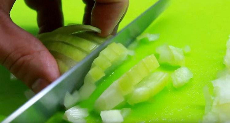Finely chop the onion.