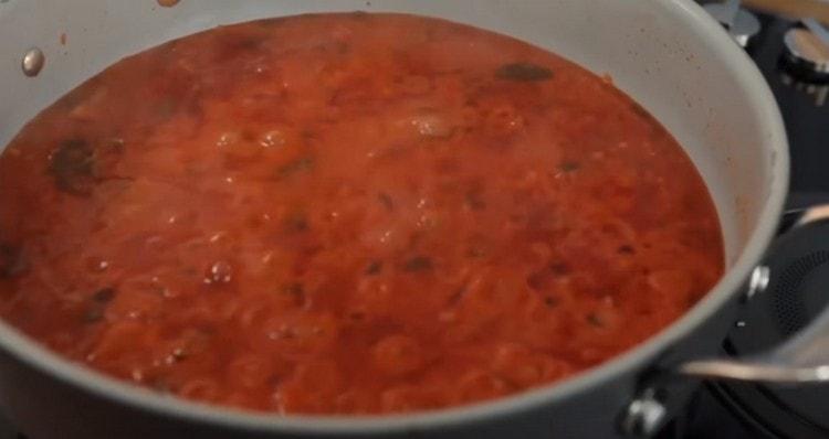 Add the tomatoes chopped in the blender and simmer everything together.