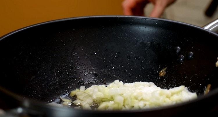 To prepare the sauce, first pass the finely chopped vegetables into the pan.