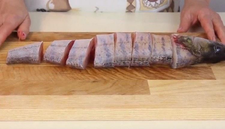 Cut the ship into portioned steaks.