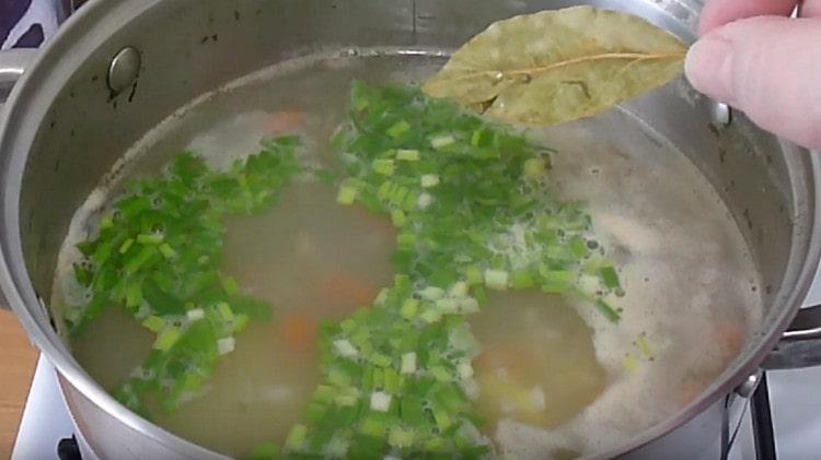 In the finished soup, add the greens, as well as the bay leaf.