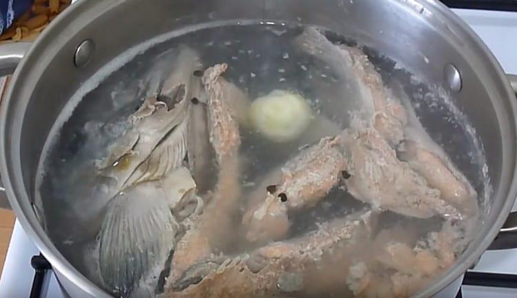 Add onion, peppercorns to the broth.