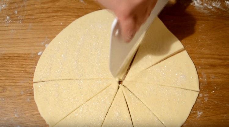 Cut the test circle into identical sectors.