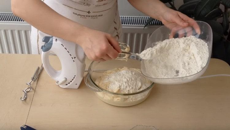 Add the remaining flour.