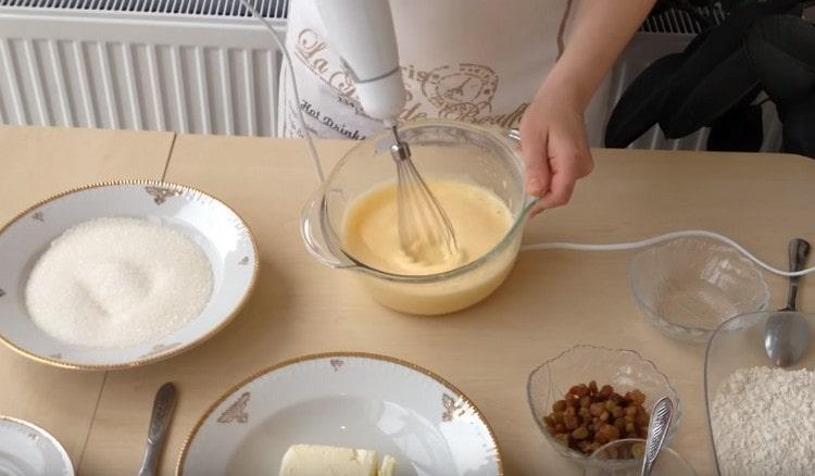 Beat the eggs with a mixer.