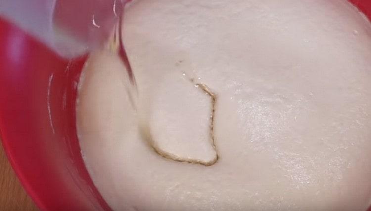 Add vegetable oil to the dough.