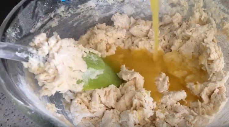 Kneading the dough, introduce butter into it.