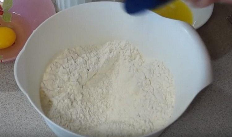 Add salt to the sifted flour.