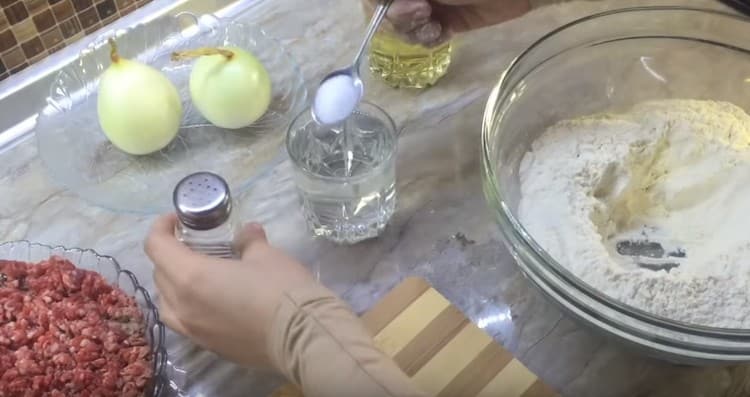 Add a teaspoon of salt to a glass of water.