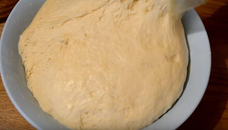 We crumble the rising dough and let it rise again.