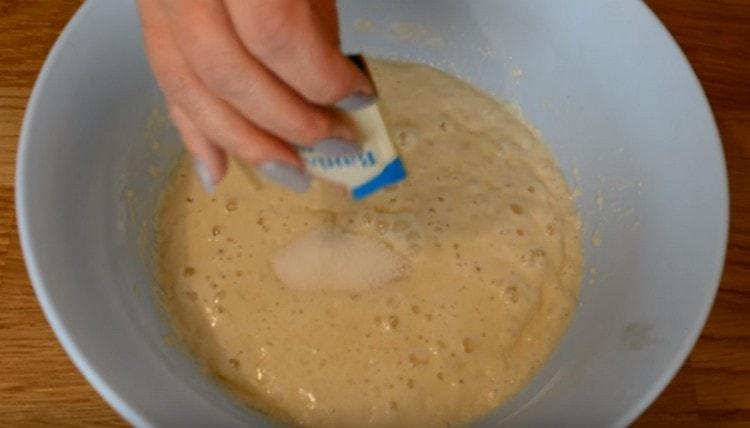 Add sugar, salt and vanilla sugar to the dough.
