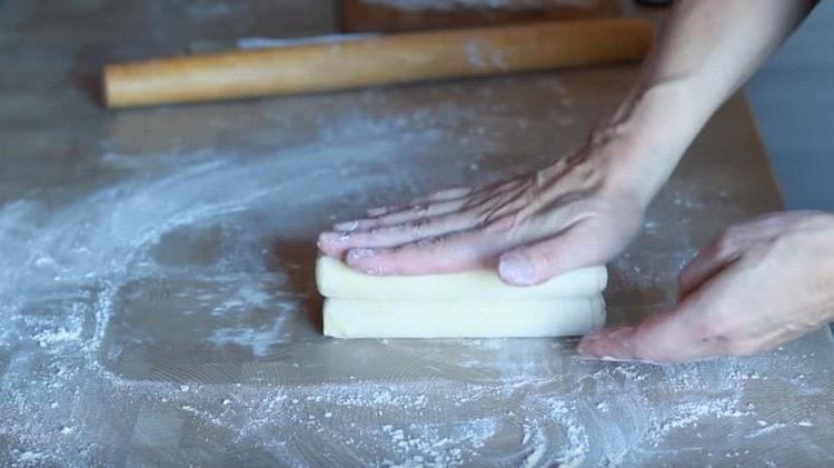 Fold the dough again four times.