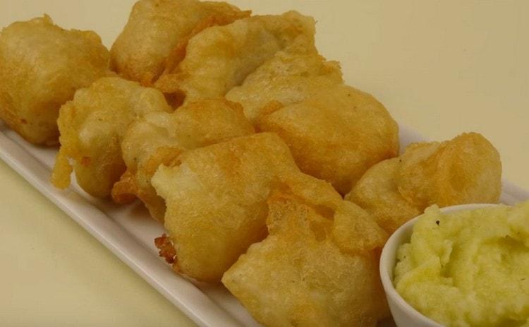 The cod in batter in the pan is very tasty.