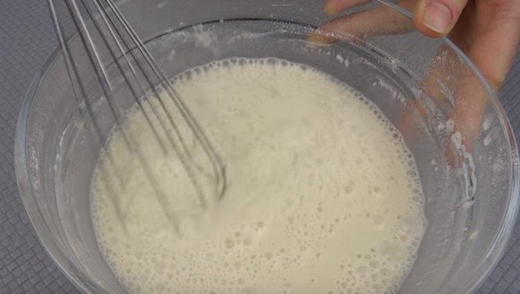 Add the flour and whisk everything.