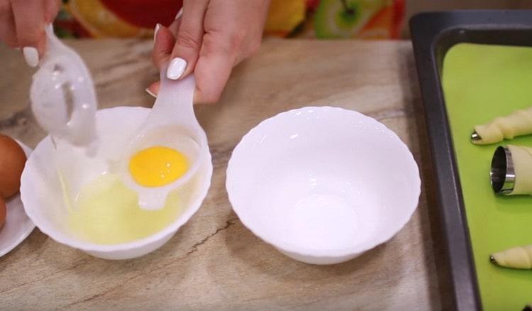 Separate the whites from the yolks.