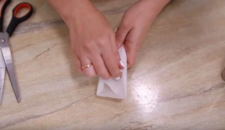 Wrap the resulting shape with a piece of parchment.