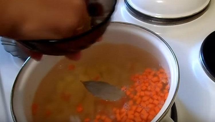 Add wheat groats as well as bay leaves.