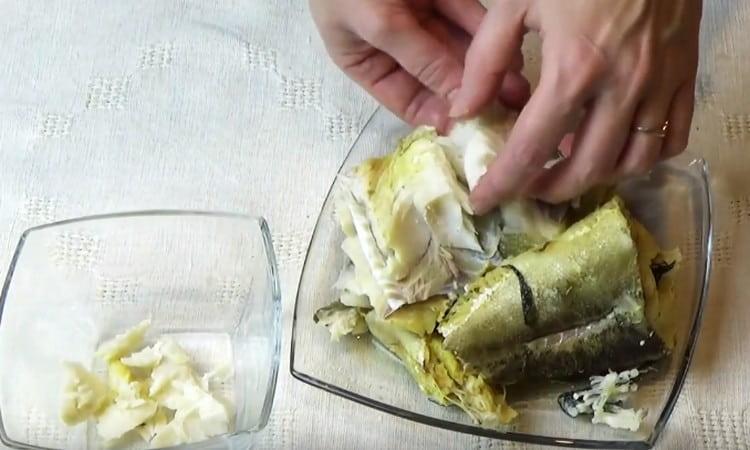 We clean the fish and remove the bones.