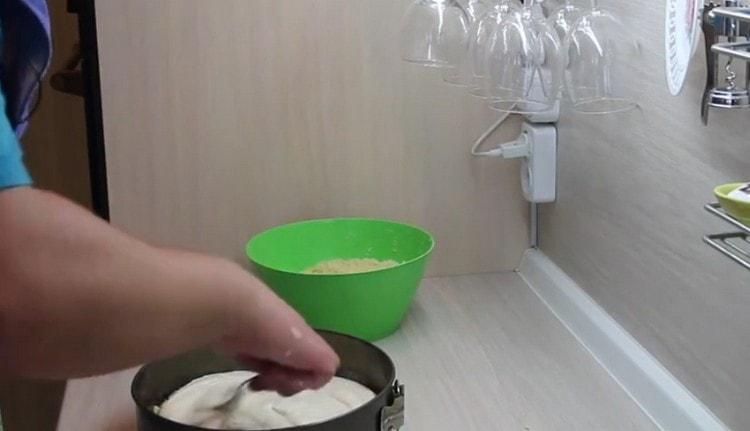 Pour the filling over the crumbs.