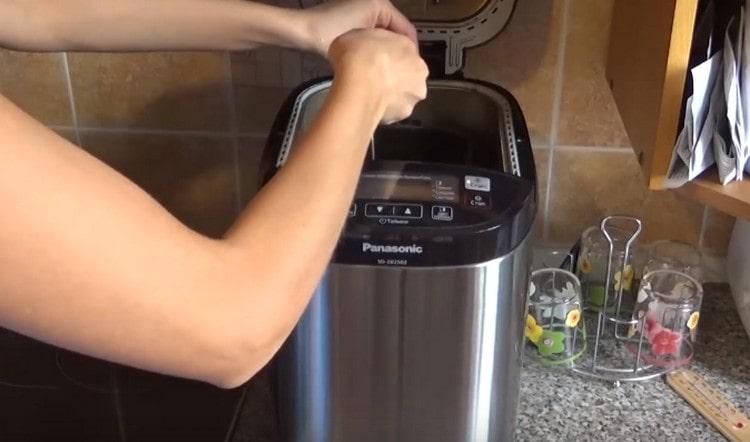 set the bucket in the bread machine.