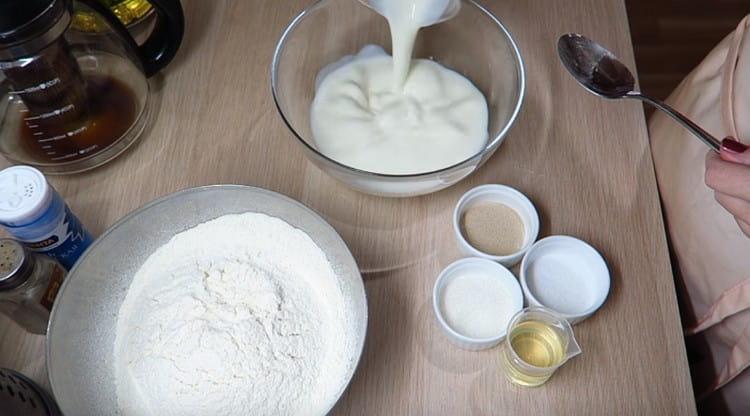Pour heated kefir into a bowl.