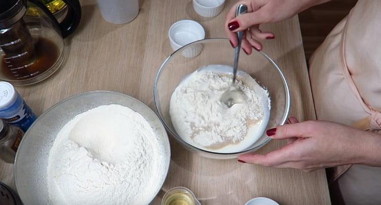 Add the flour and mix the dough.