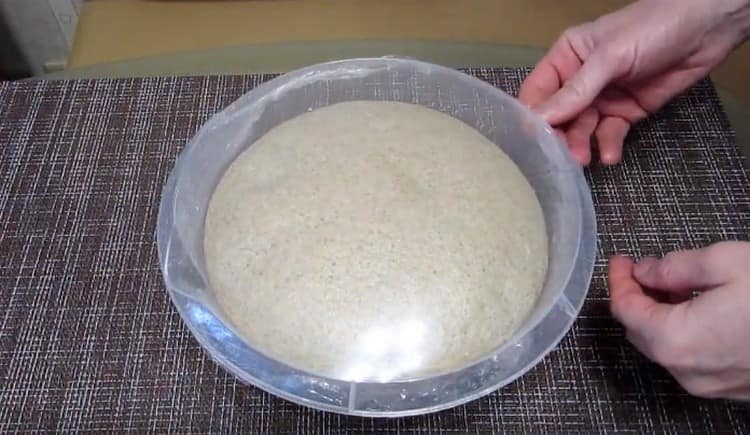 Covered with cling film, the dough went well in a warm place.