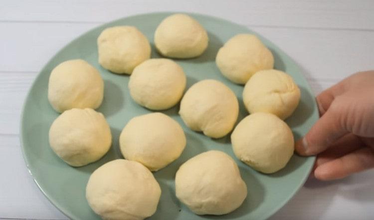 We divide the dough into 12 identical parts.