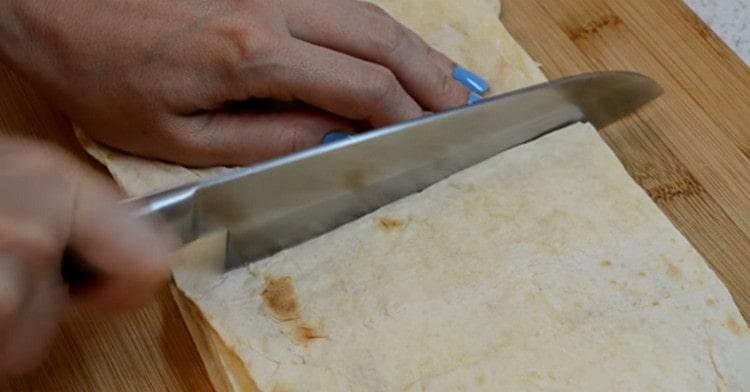 Cut lavash into squares.
