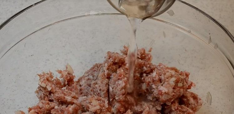 For juiciness, add water to the minced meat.