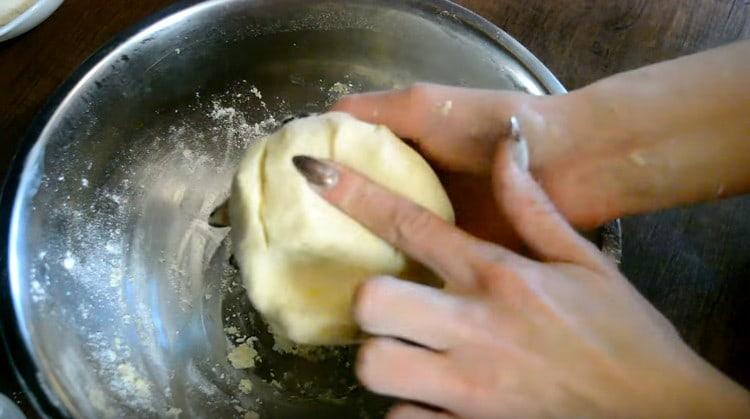 Knead the soft dough.