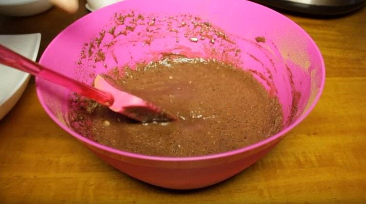 We mix the components, add milk to them and mix again.