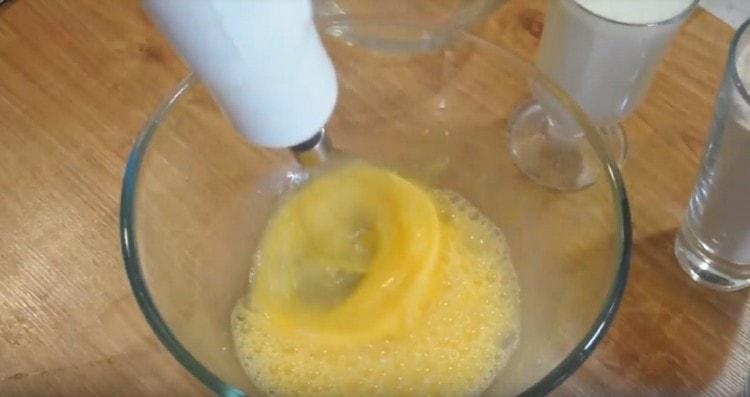 Beat the eggs with a pinch of salt.