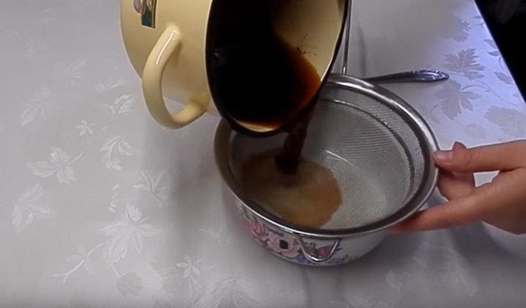 The infused marinade is filtered.