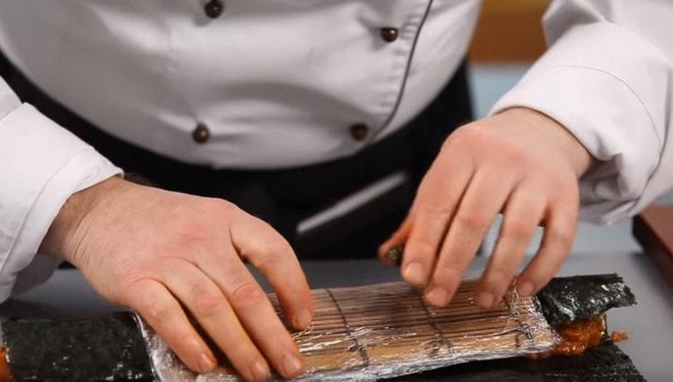 Gently twist the roll.