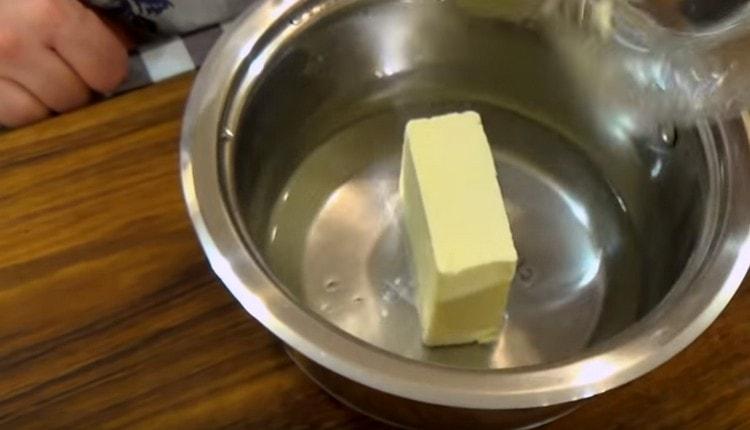 Add butter and salt to the water.