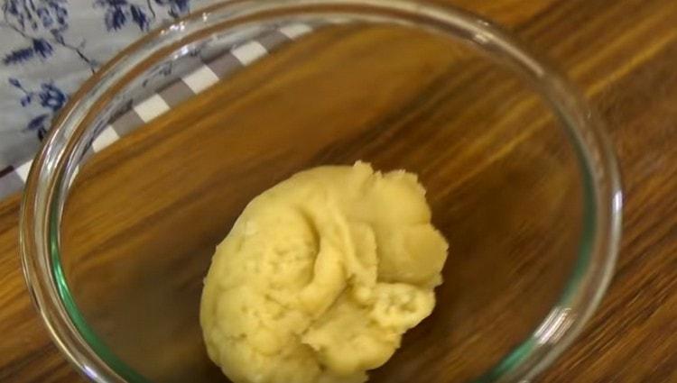 Put the dough in a bowl and let it cool a little.