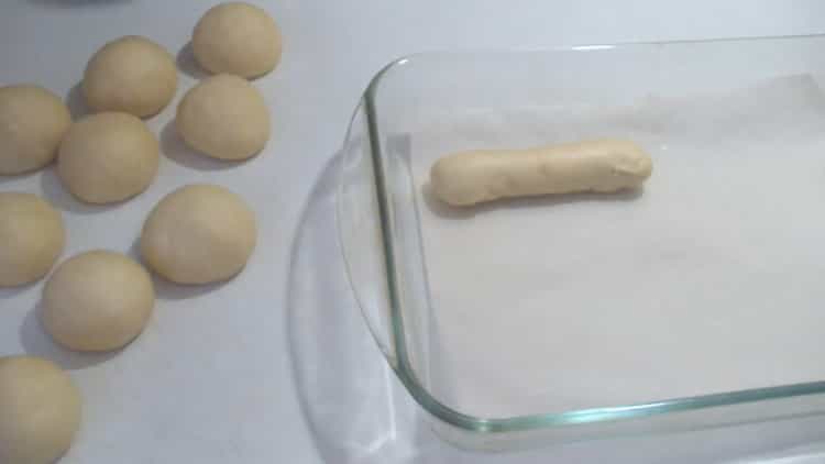 Form the dough to make hot dog rolls