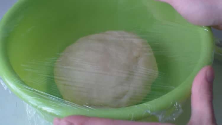 To make hot dog buns, place the dough under the film