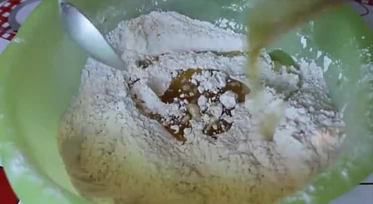 Mix the ingredients to make the buns.