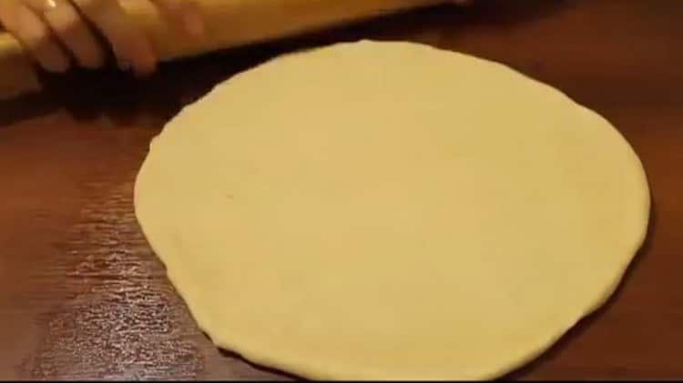 Roll out the dough to make buns