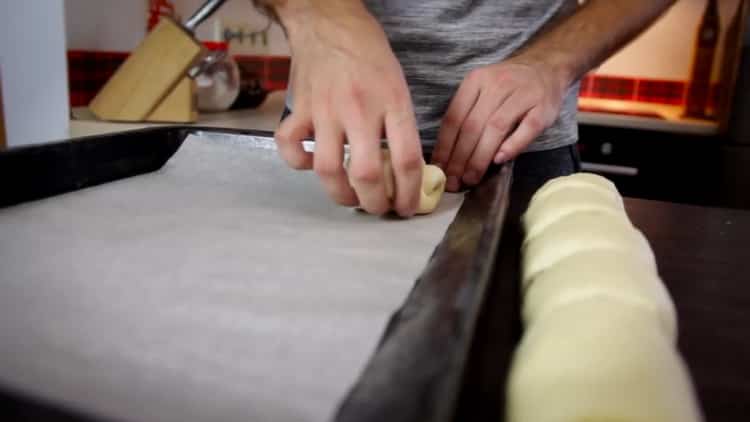 For buns with poppy seeds, prepare a baking sheet